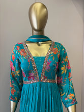 A1191 - A vibrant Pure Crepe Gown with Mirror work & a Flowy Elegant Flare.