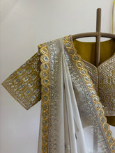 A1519 - Ivory Tissue Saree with Contrast Heavy Handwork Gota Blouse