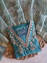 A1665 - Mul Chanderi Kurti with Handwork detailing, Striped Tissue Dupatta & Pants.