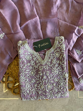 A1582 - Organza Kurti featuring Intricate Chikankari work, paired with Pants and Dupatta.