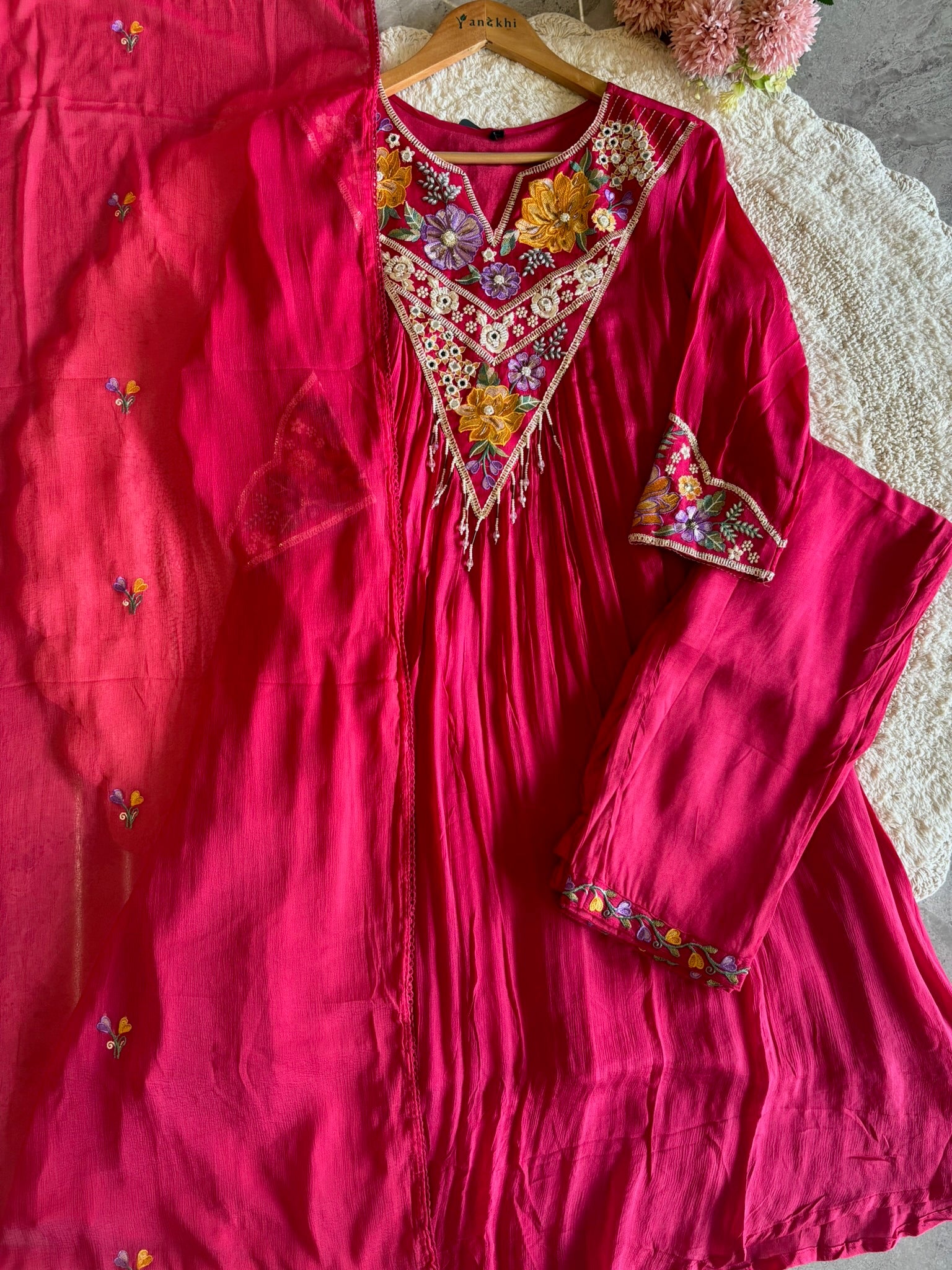 A1657- Elegant Chinon A-Line Suit with vibrant Floral Embroidery on the Yoke & Sleeves, with Pants and a delicately Embroidered Dupatta.
