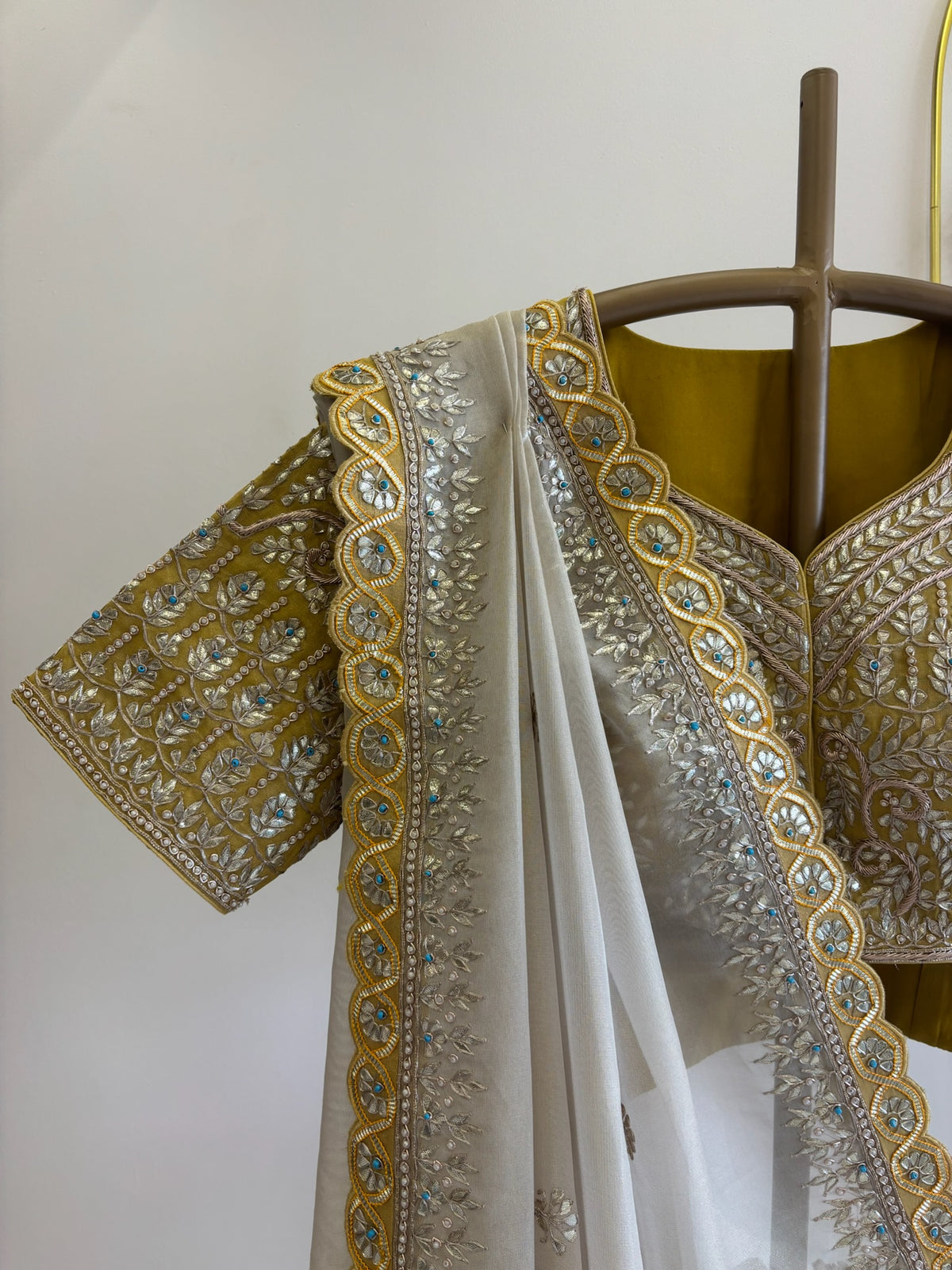 A1519 - Ivory Tissue Saree with Contrast Heavy Handwork Gota Blouse