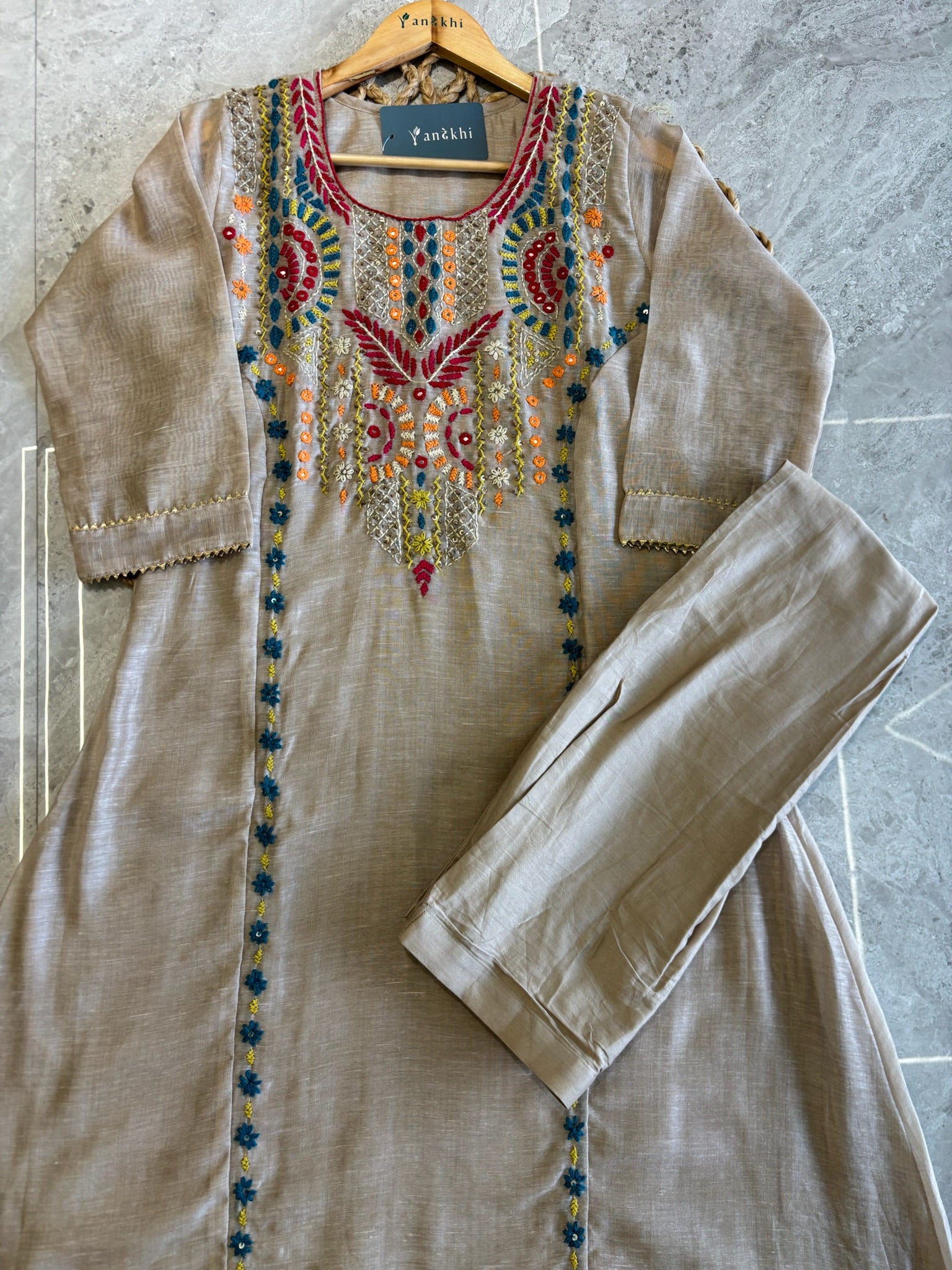 A4163- Linen suit with multicolour embroidery, detailed dupatta featuring all-over thread work.