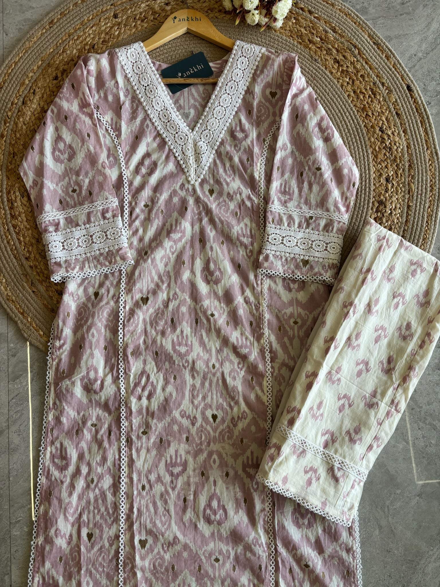 A2784- Pure Cotton Suit Set with Ikat-inspired prints, Lace detailing on the V-neckline, sleeves, and panels, paired with Printed Pants & Dupatta.