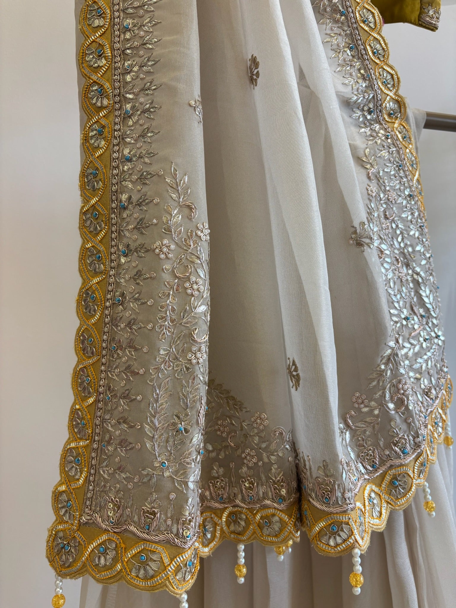 A1519 - Ivory Tissue Saree with Contrast Heavy Handwork Gota Blouse