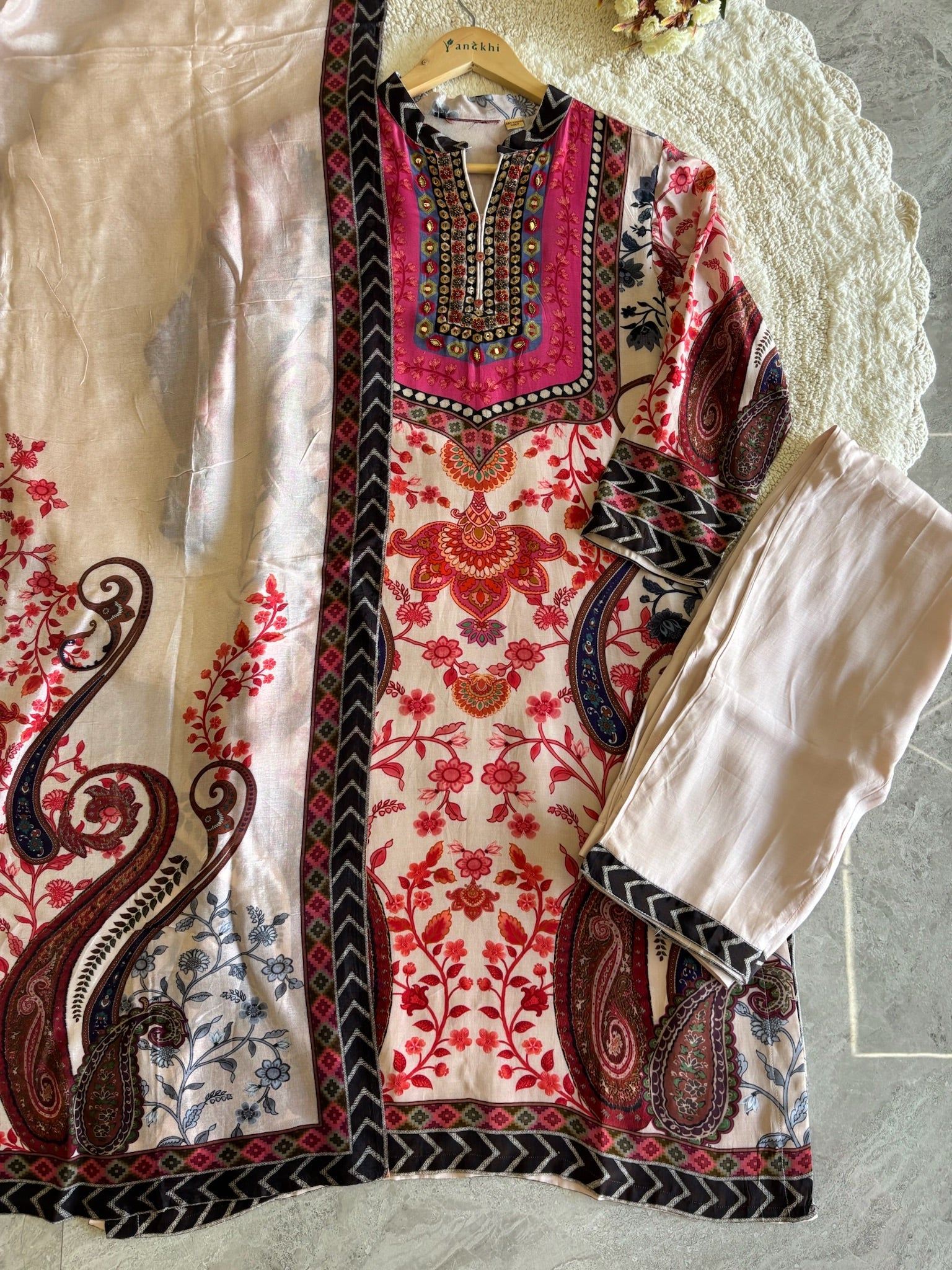 A2686- Pure Italian Silk Suit featuring Vibrant Floral & Paisley Prints with elegant Neckline Detailing, paired with Pants & Dupatta.