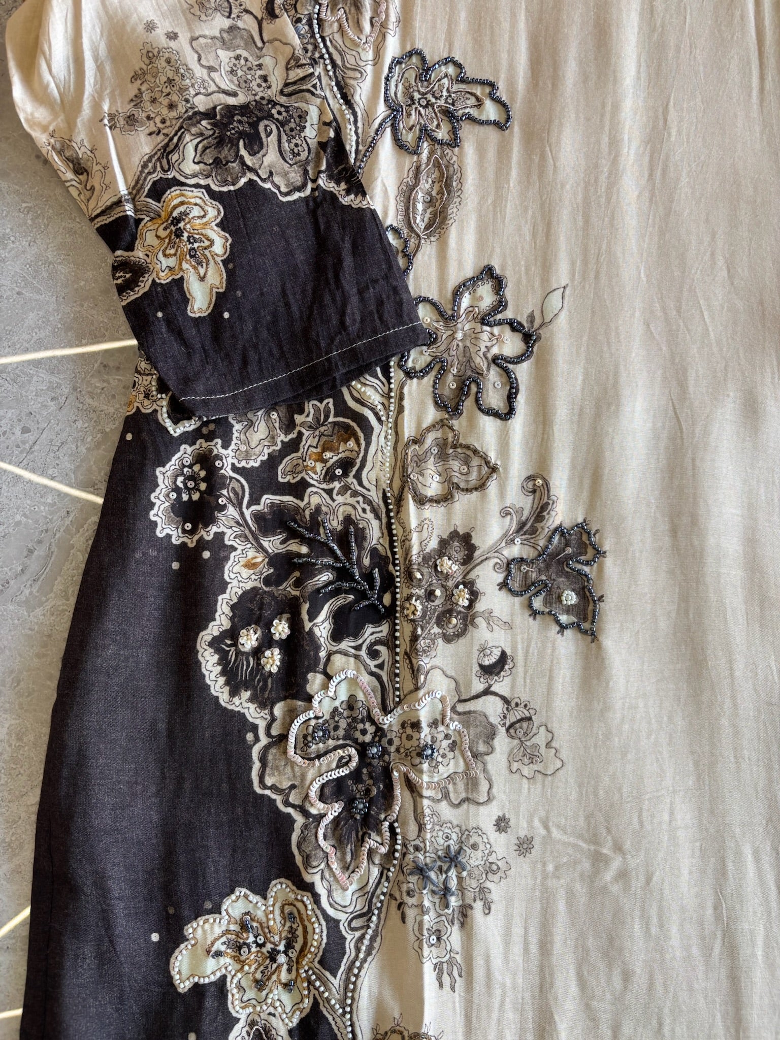 A1569 - Ivory Muslin Silk Kurti Set with Hand-Embroidered Detailing & Printed Dupatta