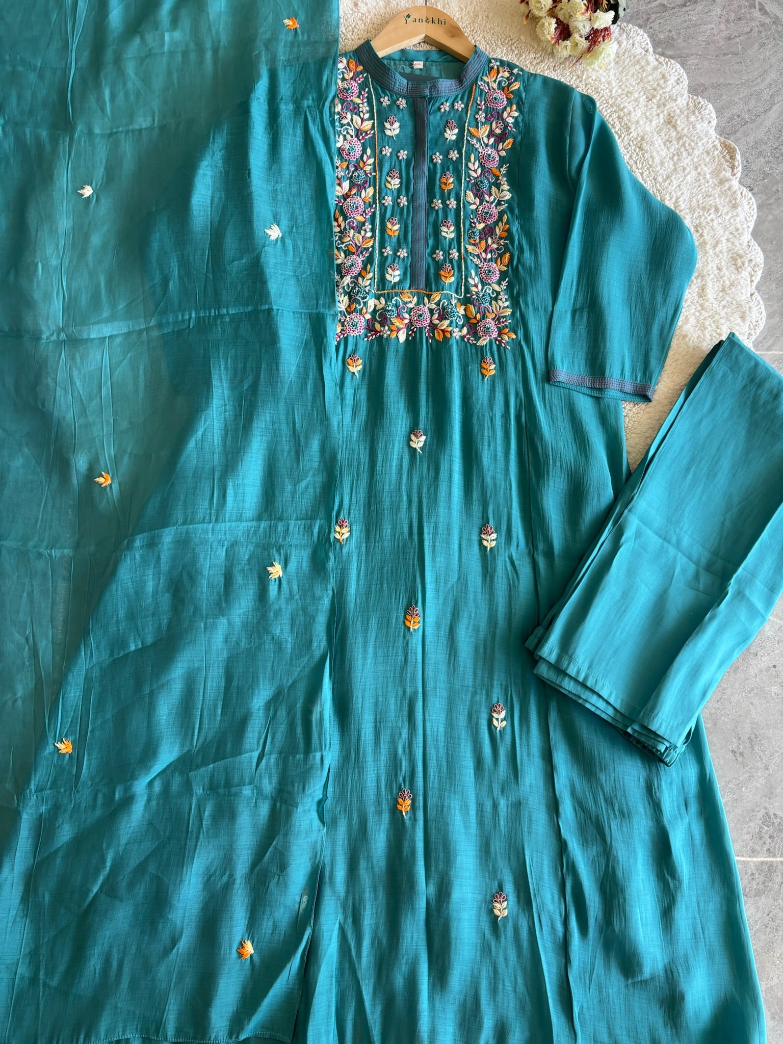A1644- Chanderi Silk A-Line Suit with Handwork on the Yoke & delicate motifs all over, paired with Pants and Embroidered Dupatta.
