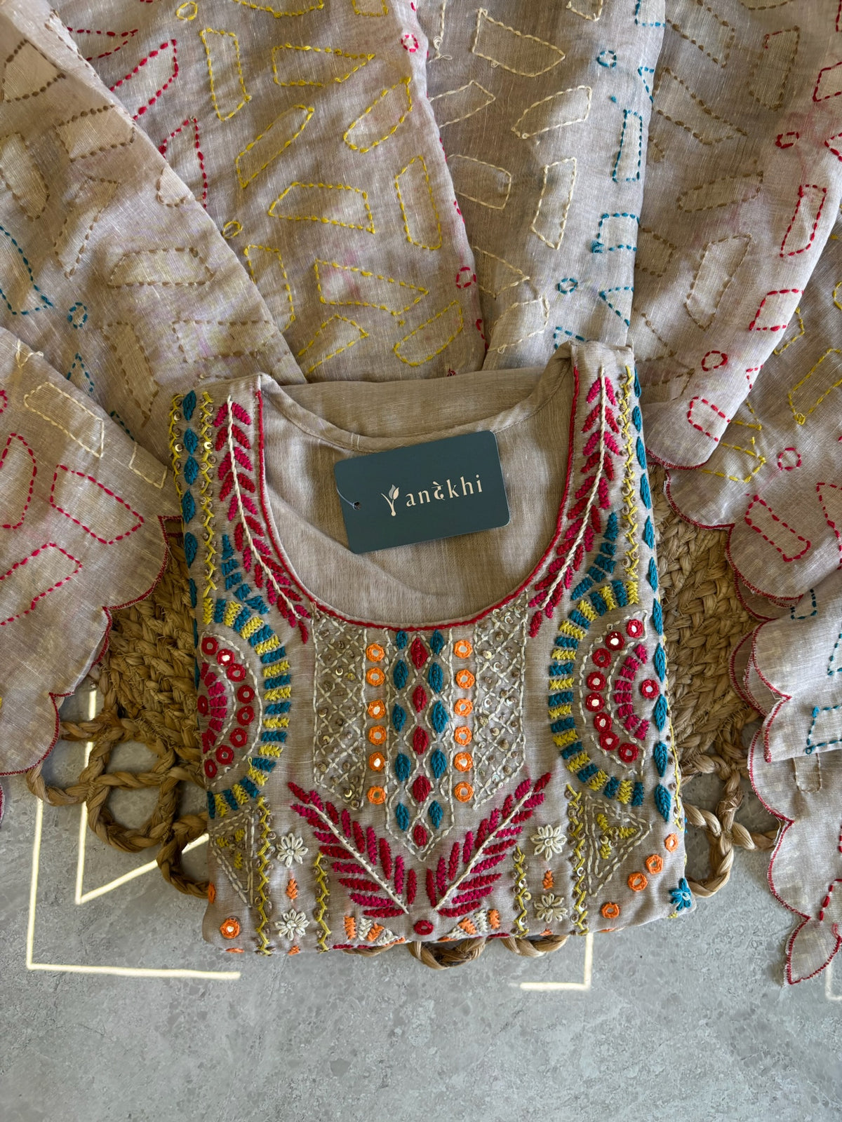 A4163- Linen suit with multicolour embroidery, detailed dupatta featuring all-over thread work.