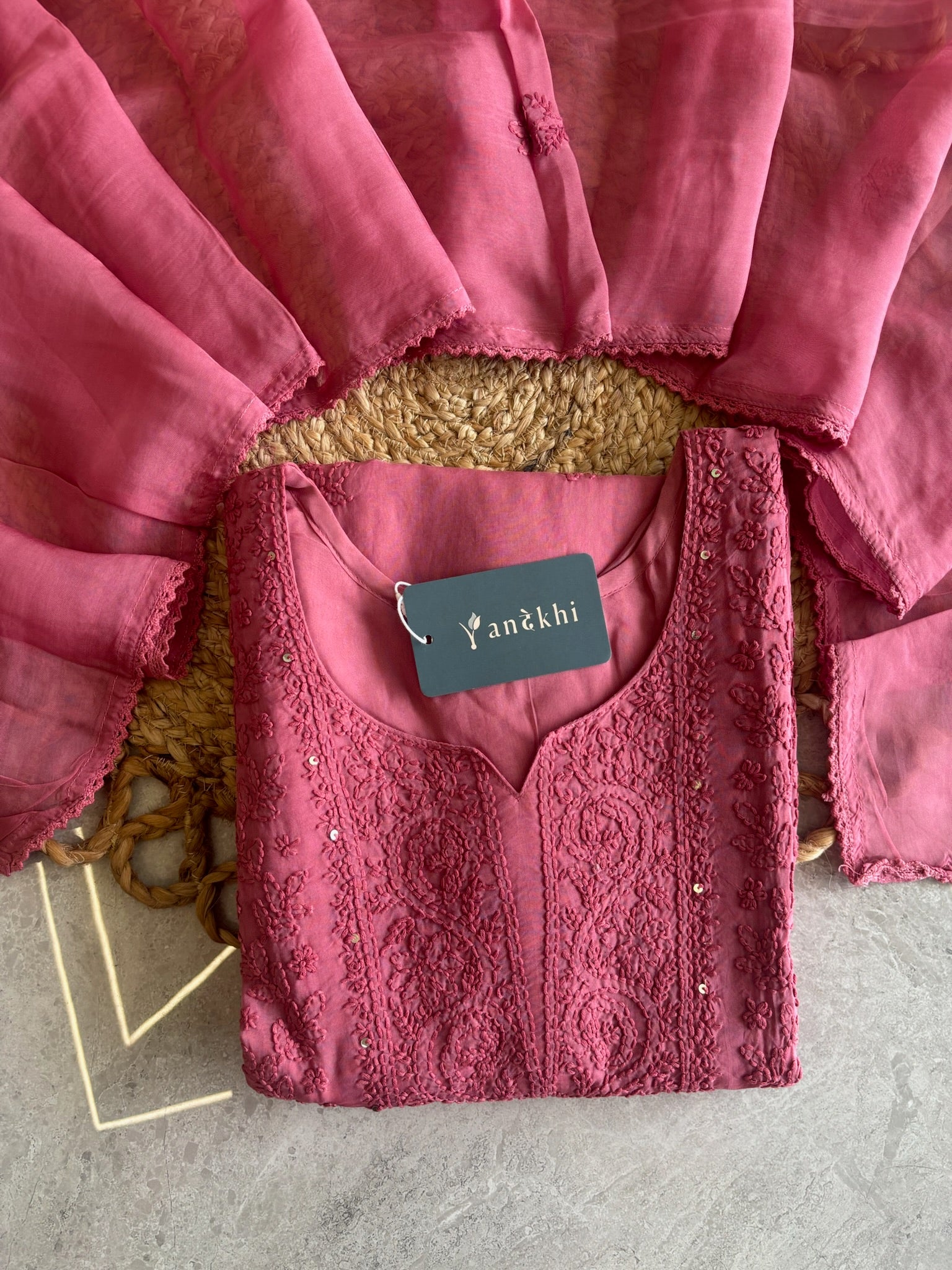 A1587 - Organza Kurti featuring Intricate Chikankari work, paired with Pants and Dupatta.