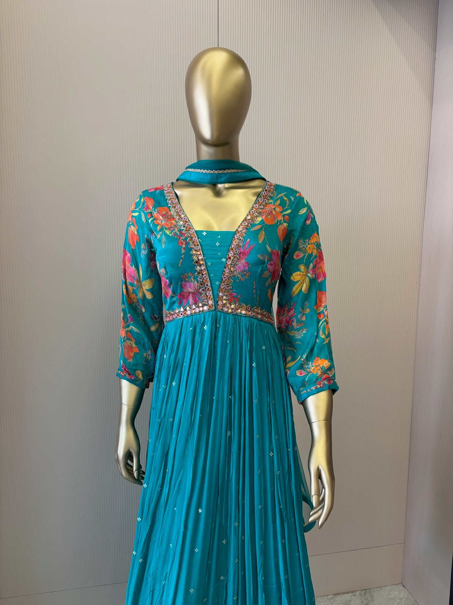 A1191 - A vibrant Pure Crepe Gown with Mirror work & a Flowy Elegant Flare.