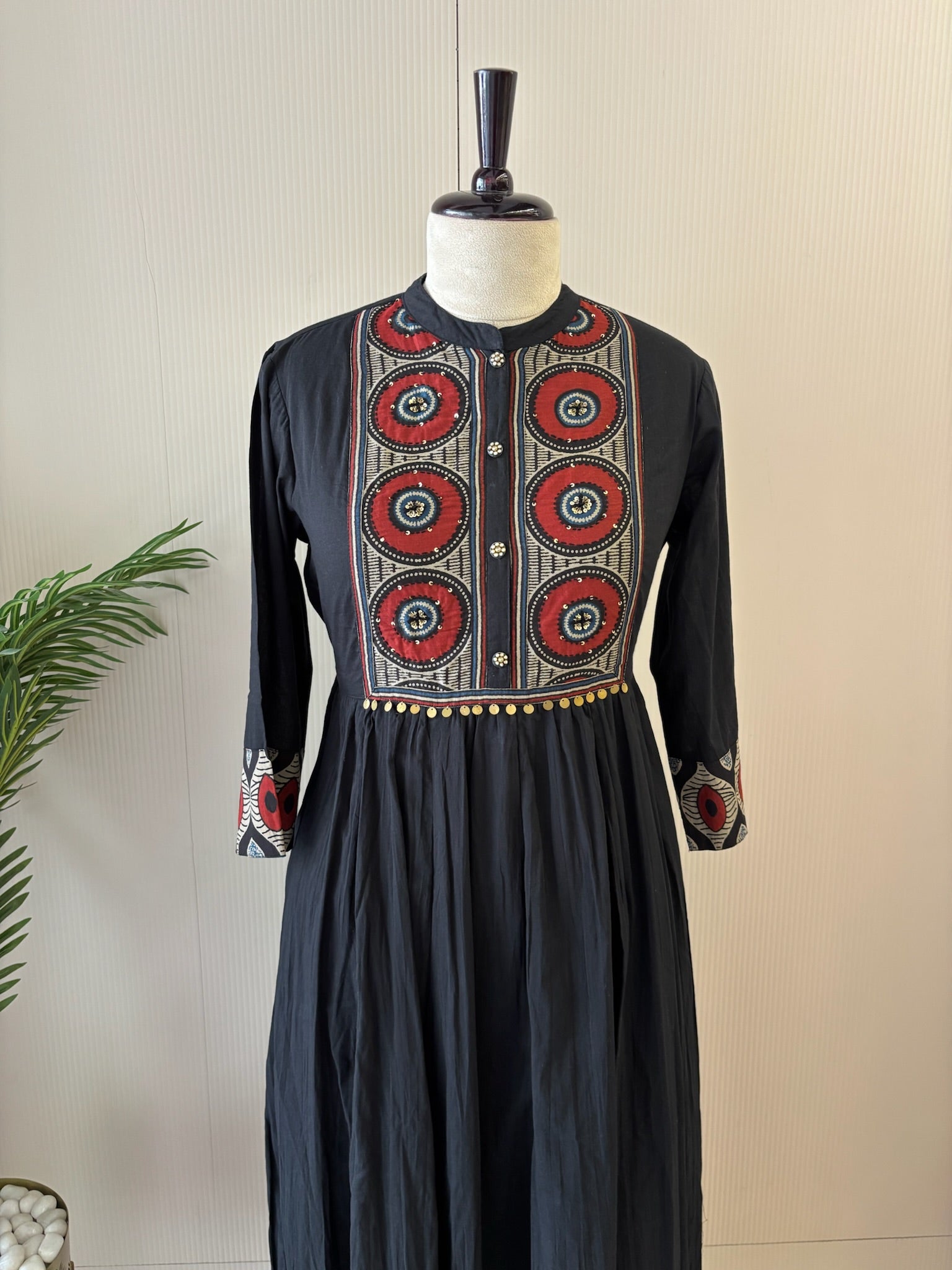 A3914- Pure Cotton Flared Gown adorned with vibrant prints on the Yoke, Sleeves & hem & elegant button detailing.
