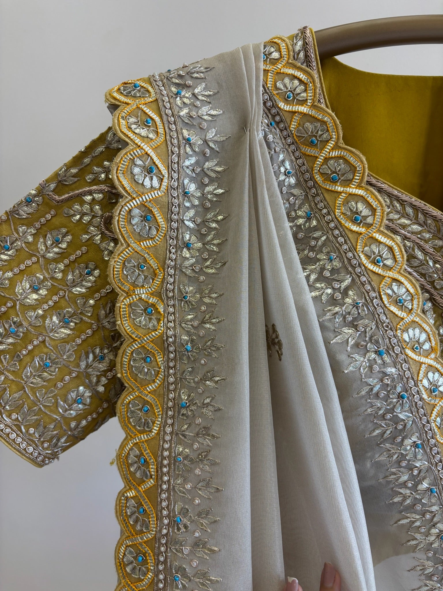 A1519 - Ivory Tissue Saree with Contrast Heavy Handwork Gota Blouse