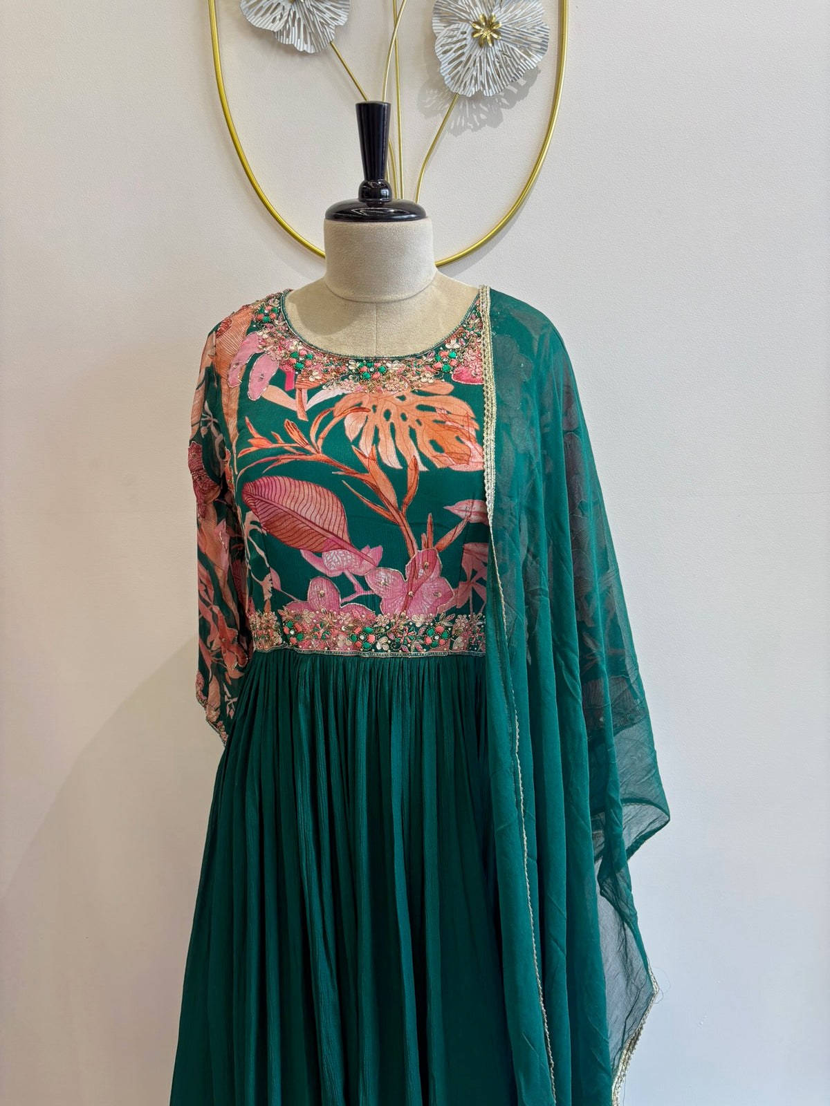 A1194 - Gown with Intricate Embroidered Bodice, Statement Waist Detailing, and a Flowy Flare.