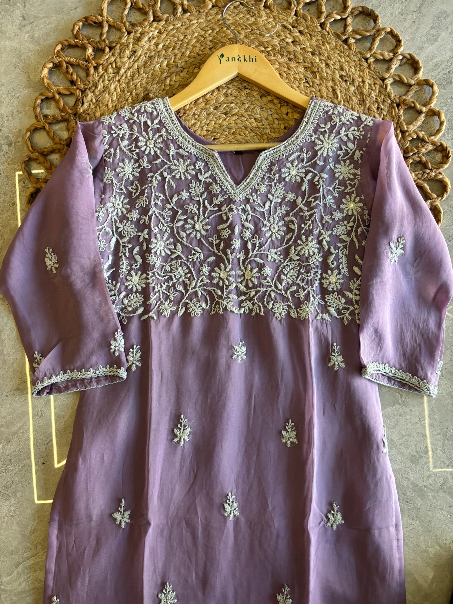 A1582 - Organza Kurti featuring Intricate Chikankari work, paired with Pants and Dupatta.
