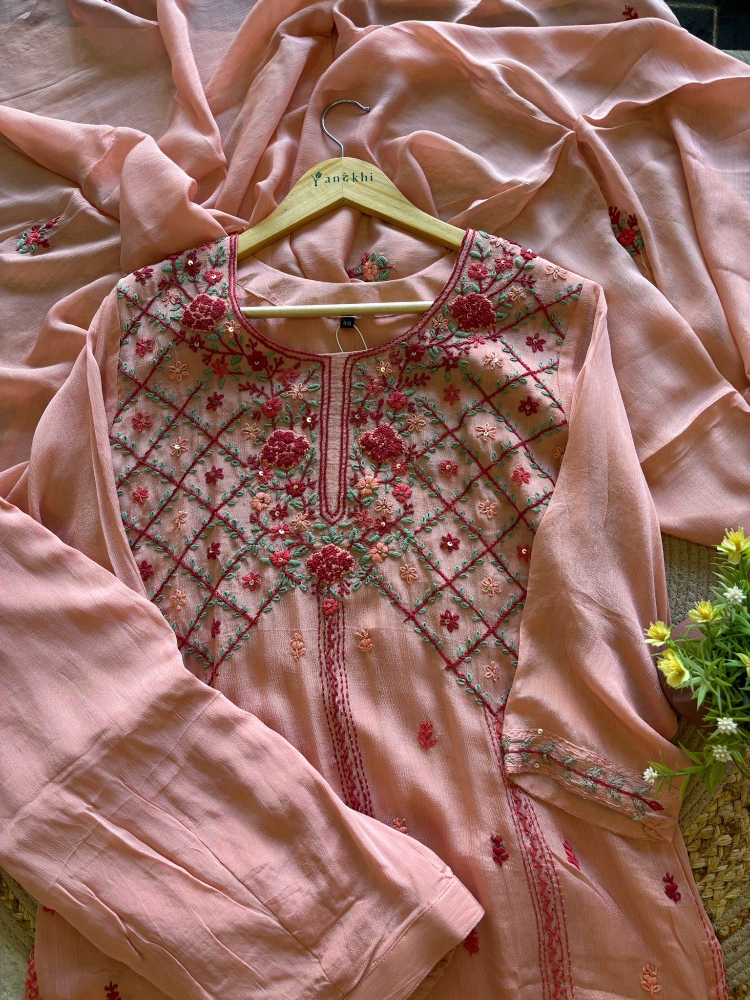 A1568 - Pure Chinon Kurti featuring Intricate Chikankari work, paired with Plazo & Dupatta.
