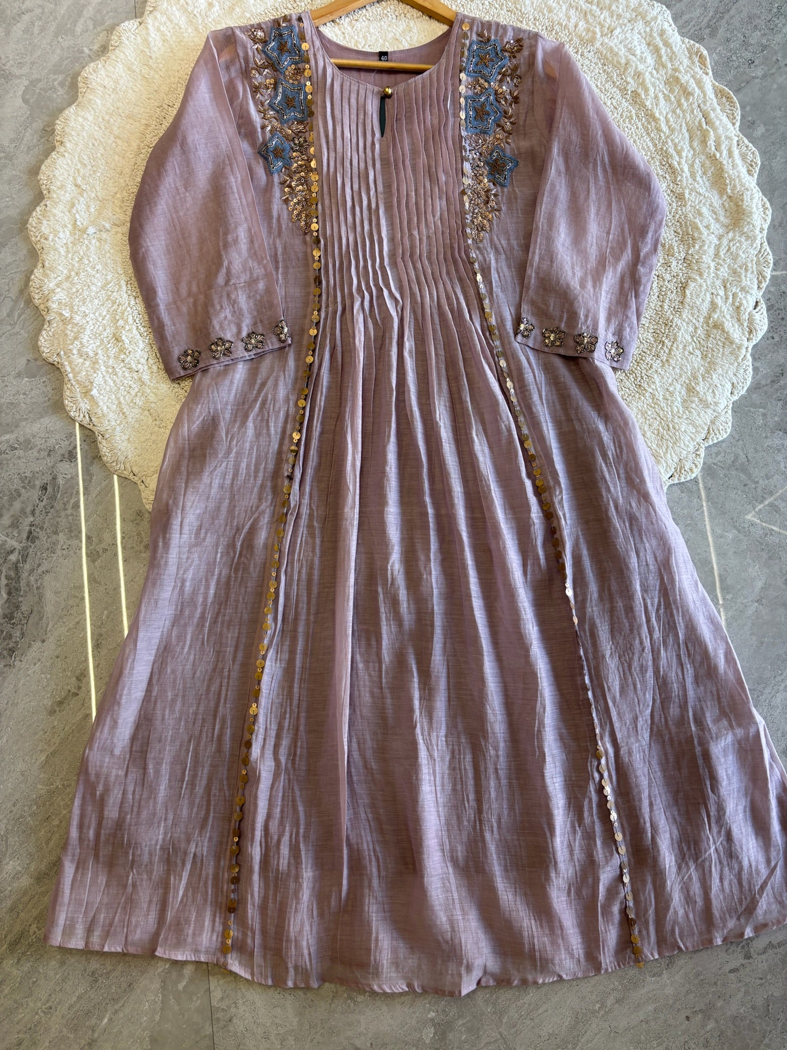 A4149- Pure Mul Chanderi Suit with Pleats detailing, intricate Zari, Sequin & Thread Handwork on the Neckline & Sleeves.
