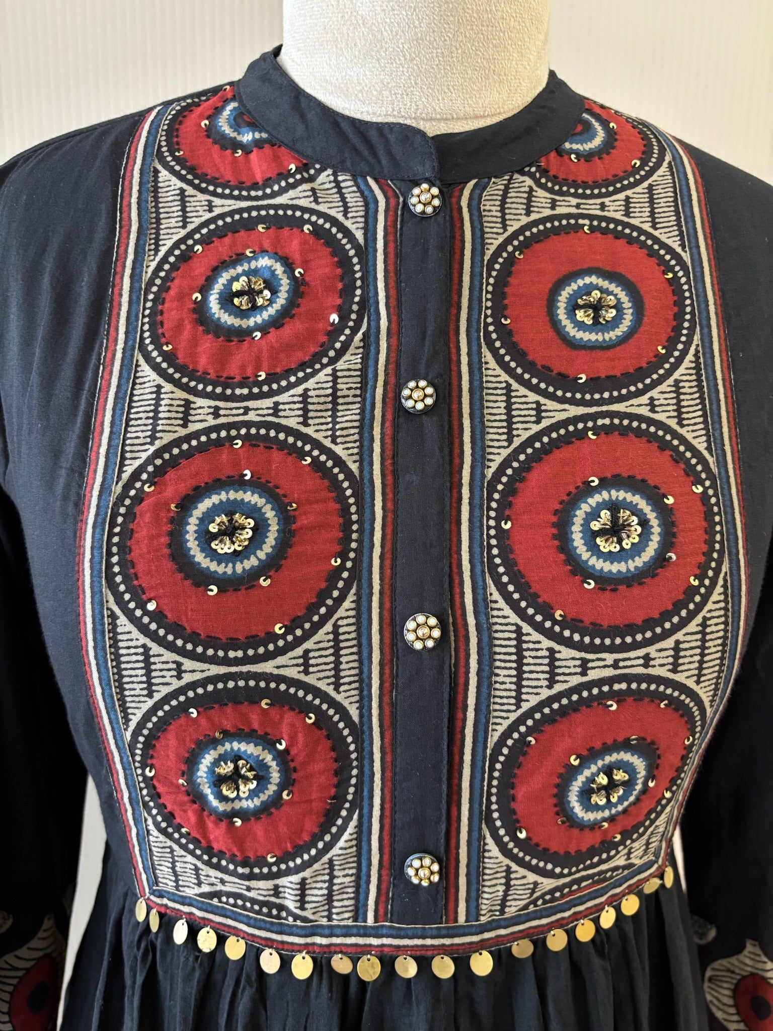 A3914- Pure Cotton Flared Gown adorned with vibrant prints on the Yoke, Sleeves & hem & elegant button detailing.