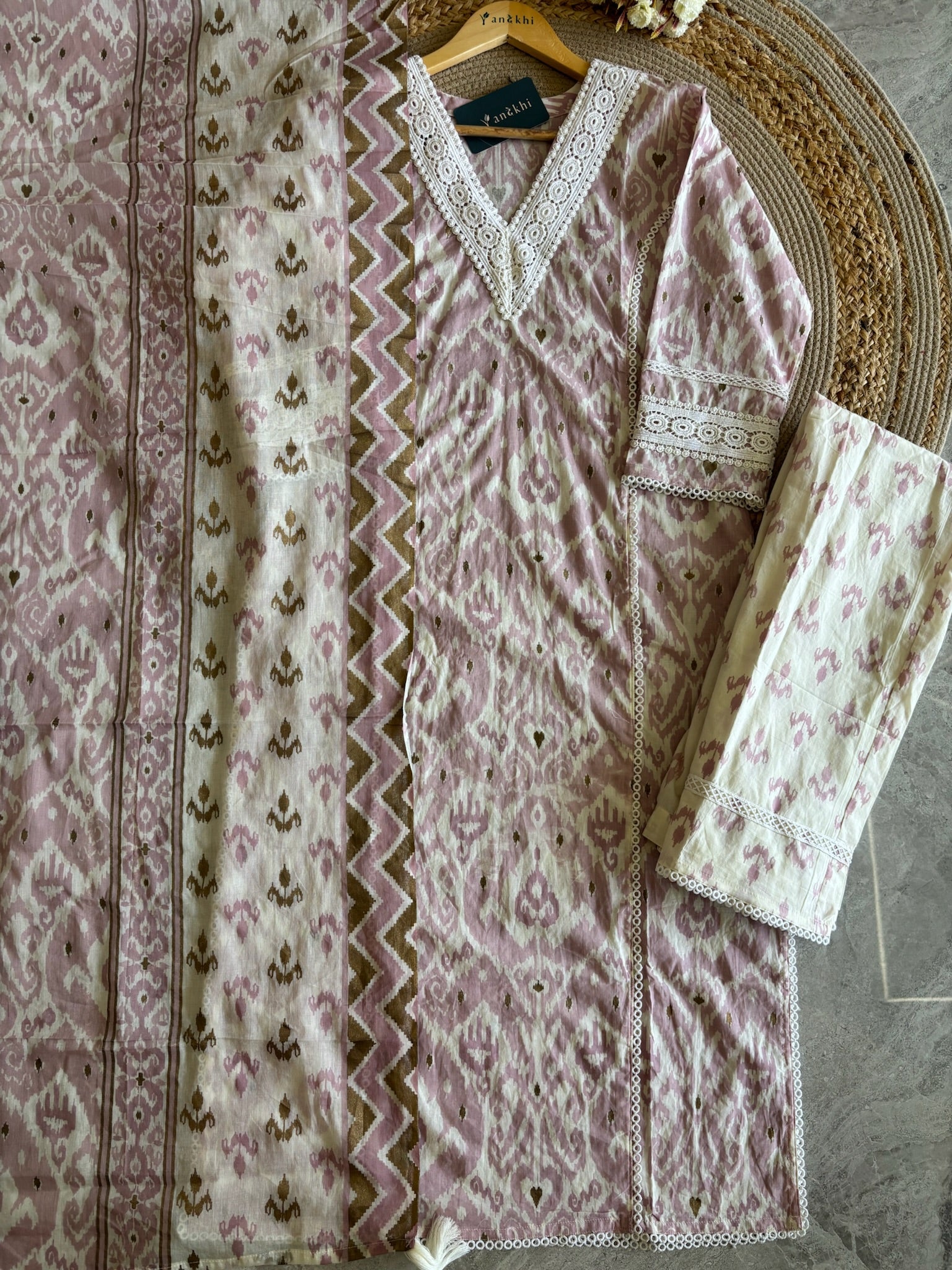 A2784- Pure Cotton Suit Set with Ikat-inspired prints, Lace detailing on the V-neckline, sleeves, and panels, paired with Printed Pants & Dupatta.
