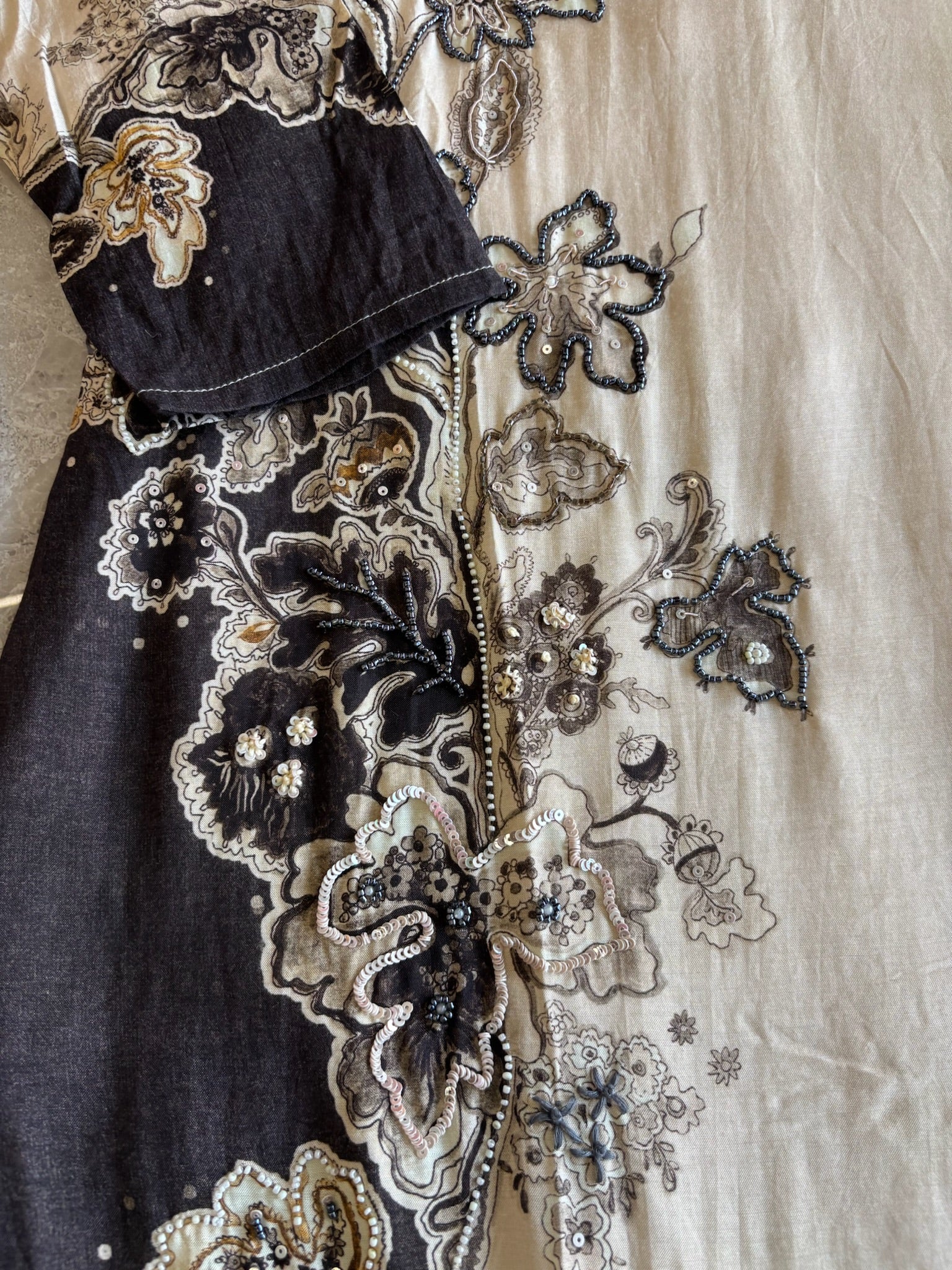A1569 - Ivory Muslin Silk Kurti Set with Hand-Embroidered Detailing & Printed Dupatta
