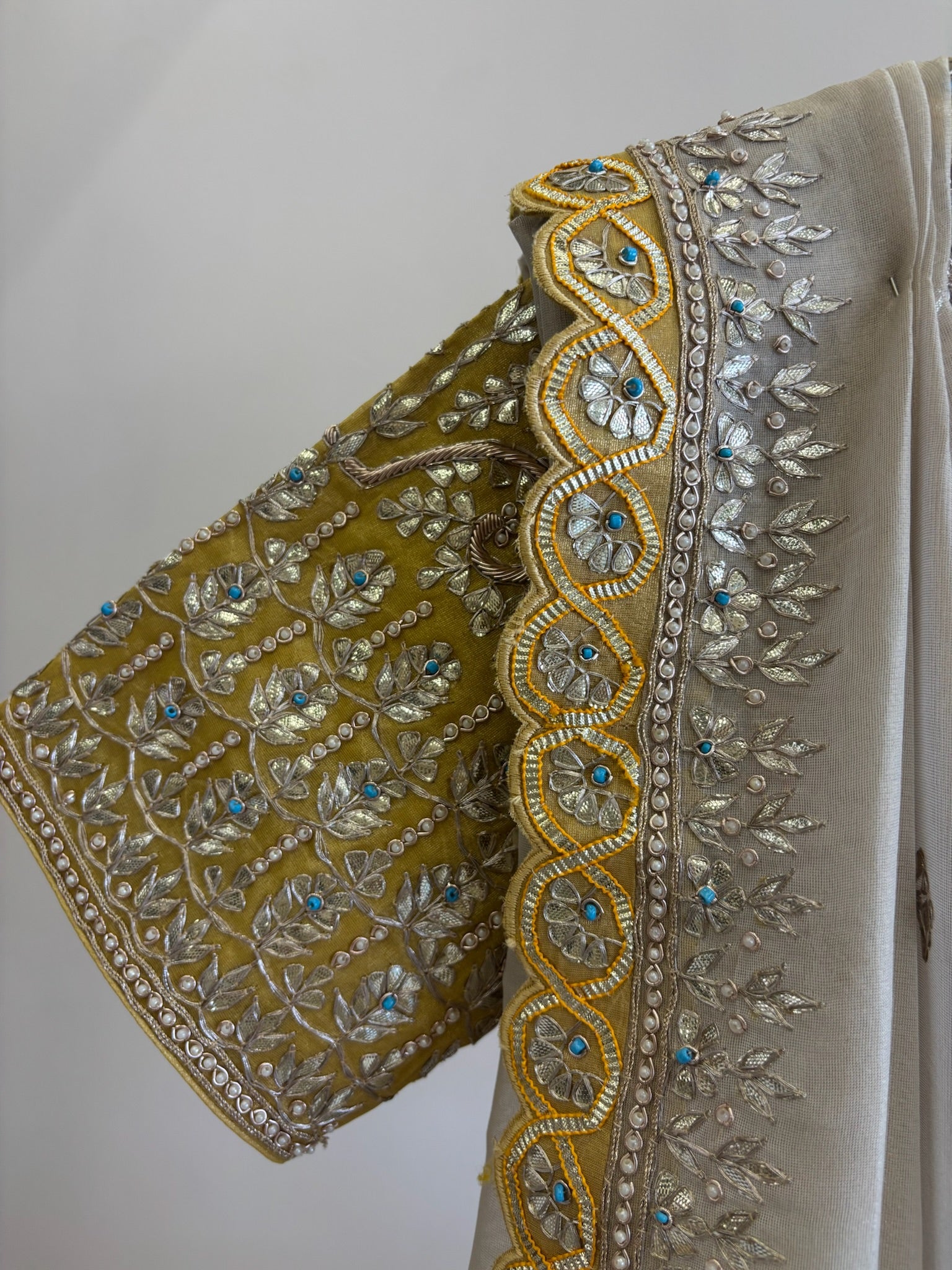 A1519 - Ivory Tissue Saree with Contrast Heavy Handwork Gota Blouse
