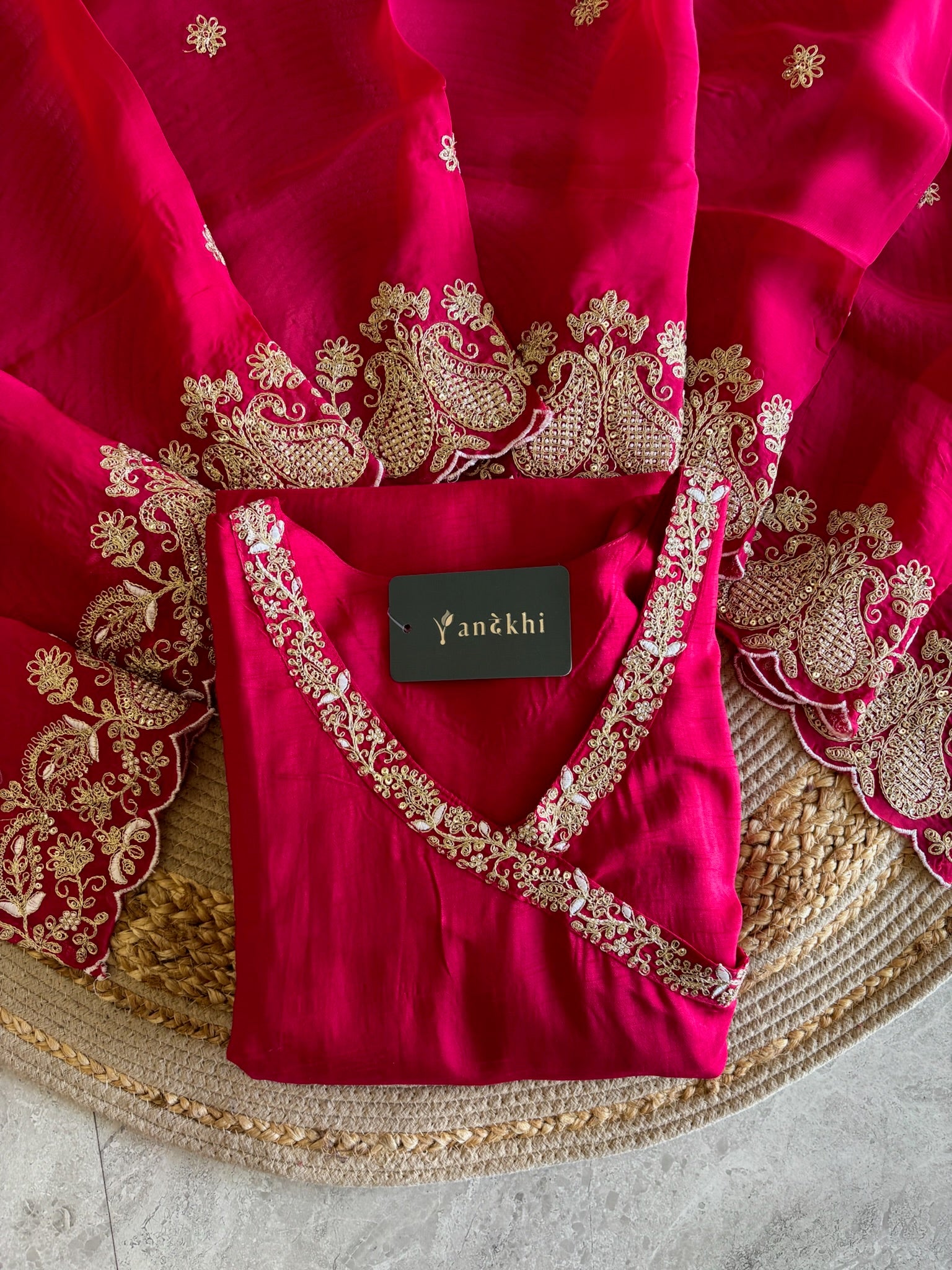 A4150- Dola Silk Angrakha Suit featuring all-over Embroidery, heavily embellished Sleeves, Matching Pants, & Embroidered Heavy Dupatta.