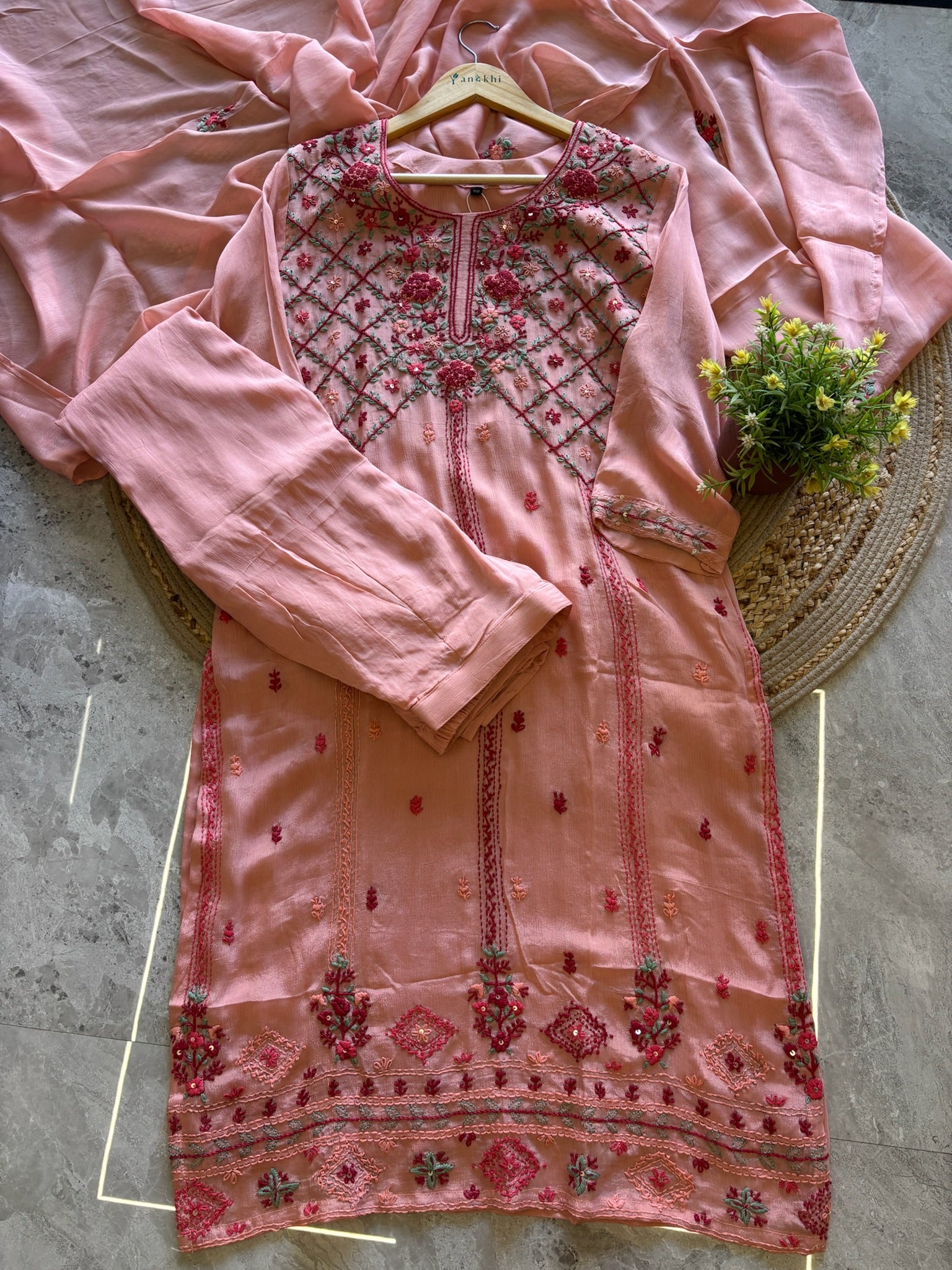 A1568 - Pure Chinon Kurti featuring Intricate Chikankari work, paired with Plazo & Dupatta.