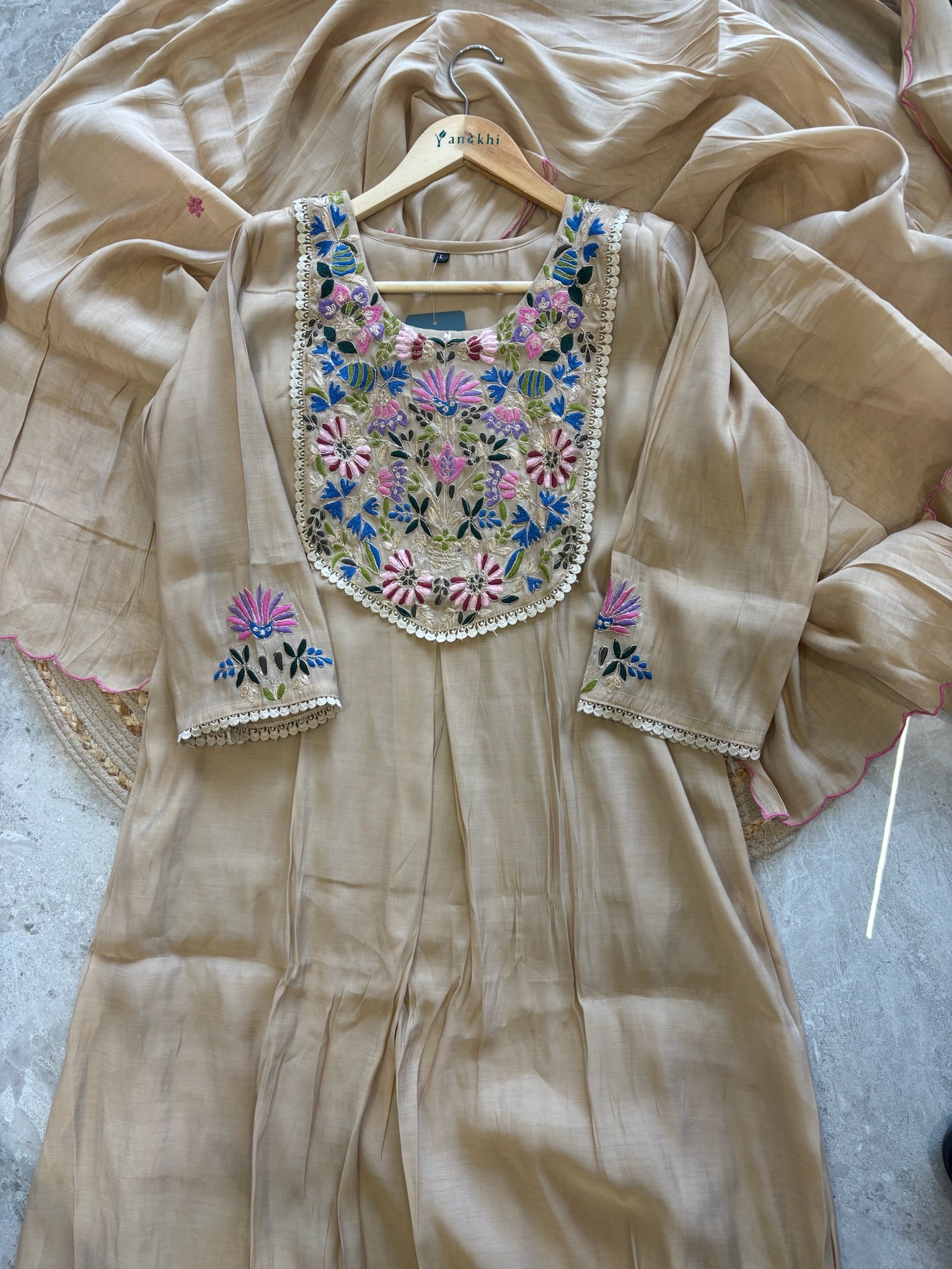 A1643 - Mul Chanderi Kurti, featuring Vibrant Embroidered yoke detailing, a flowy Dupatta & Pants.