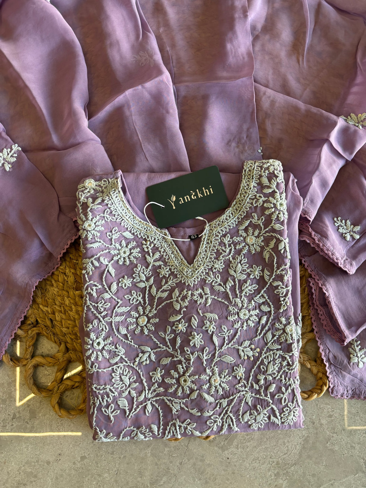 A1582 - Organza Kurti featuring Intricate Chikankari work, paired with Pants and Dupatta.