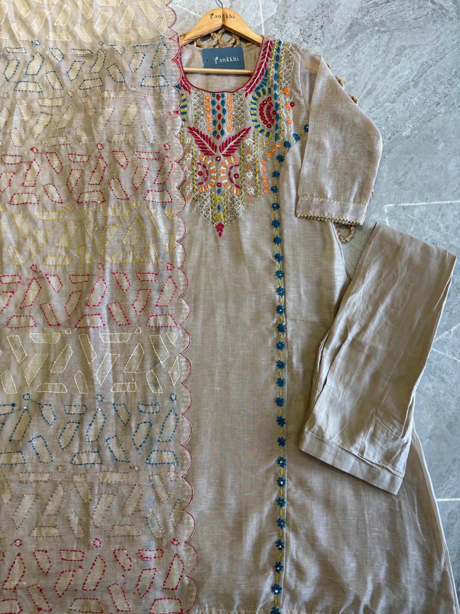 A4163- Linen suit with multicolour embroidery, detailed dupatta featuring all-over thread work.