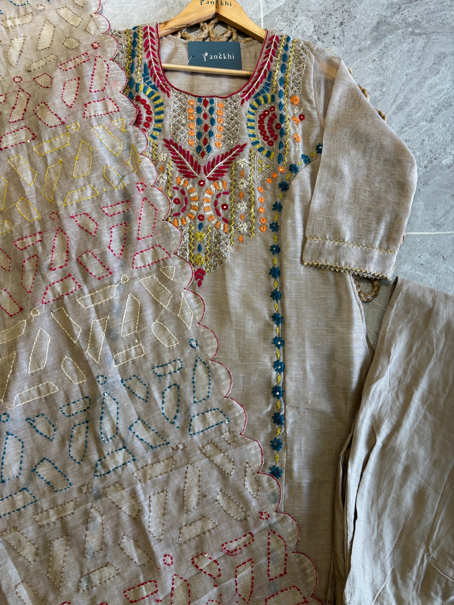 A4163- Linen suit with multicolour embroidery, detailed dupatta featuring all-over thread work.