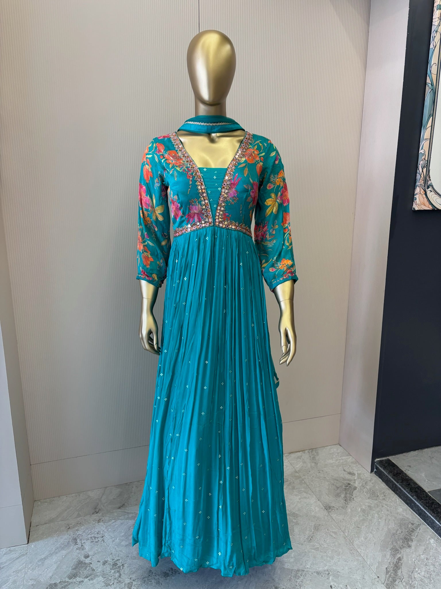 A1191 - A vibrant Pure Crepe Gown with Mirror work & a Flowy Elegant Flare.