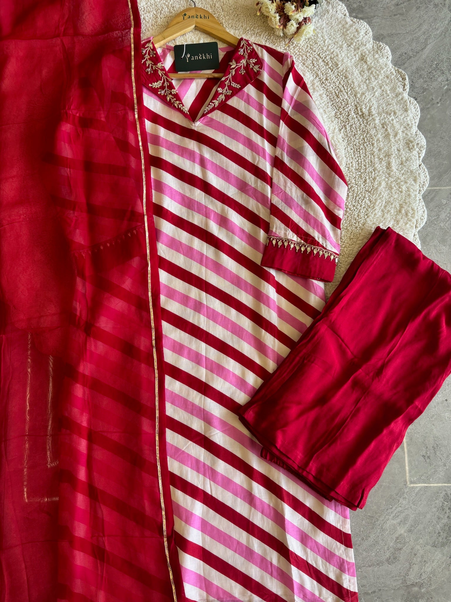A1105- Leheriya Cotton Silk Suit Set featuring Embroidered Neckline, contrasting Pants & Organza Dupatta.