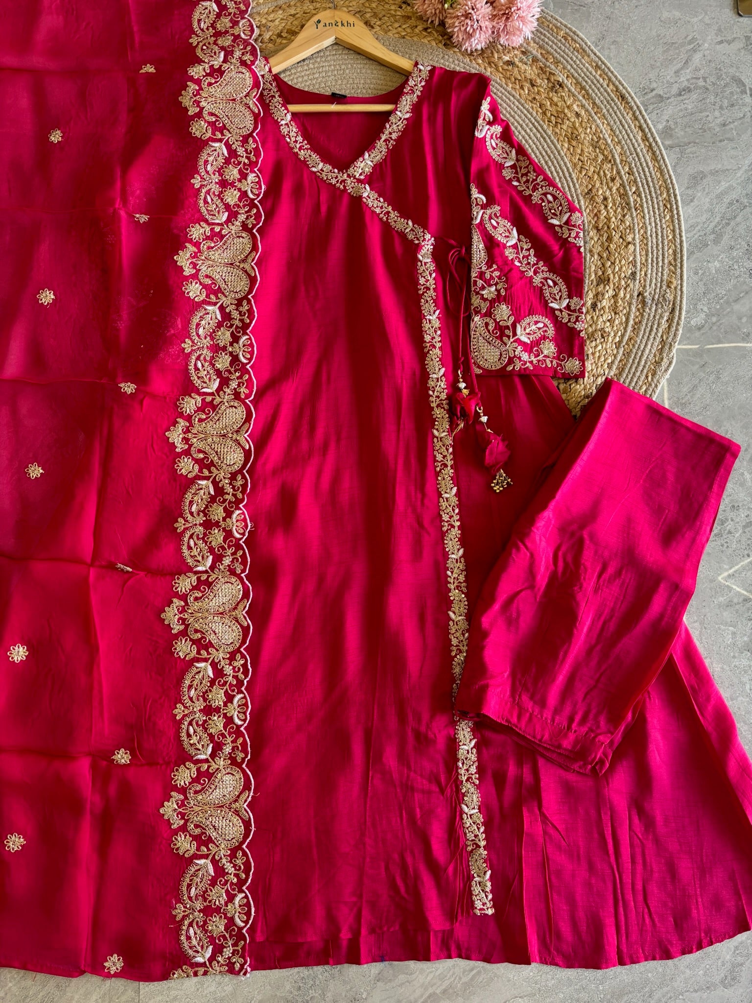 A4150- Dola Silk Angrakha Suit featuring all-over Embroidery, heavily embellished Sleeves, Matching Pants, & Embroidered Heavy Dupatta.