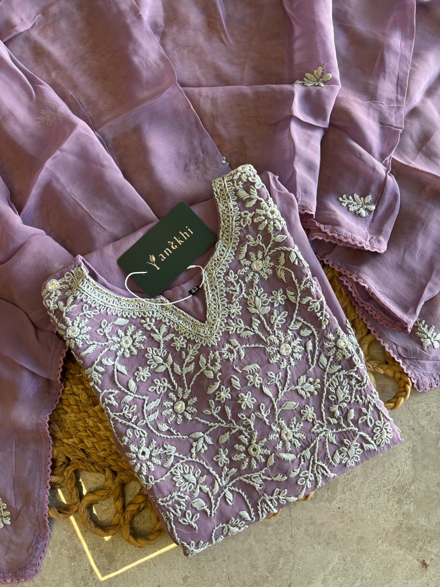A1582 - Organza Kurti featuring Intricate Chikankari work, paired with Pants and Dupatta.