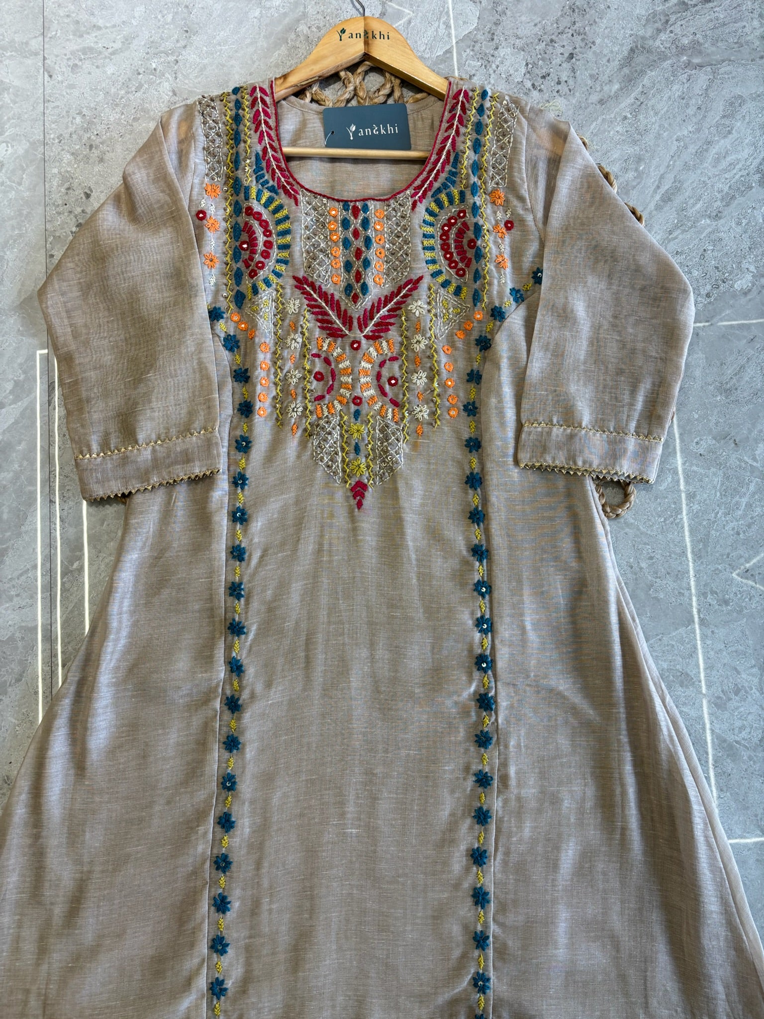 A4163- Linen suit with multicolour embroidery, detailed dupatta featuring all-over thread work.