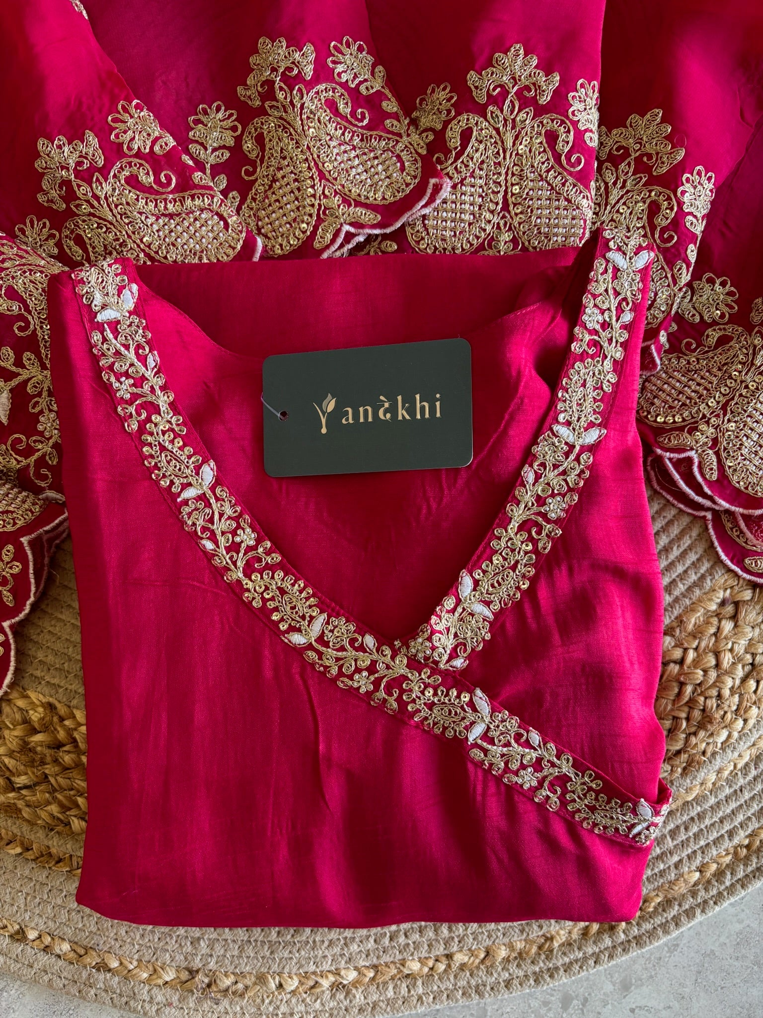 A4150- Dola Silk Angrakha Suit featuring all-over Embroidery, heavily embellished Sleeves, Matching Pants, & Embroidered Heavy Dupatta.