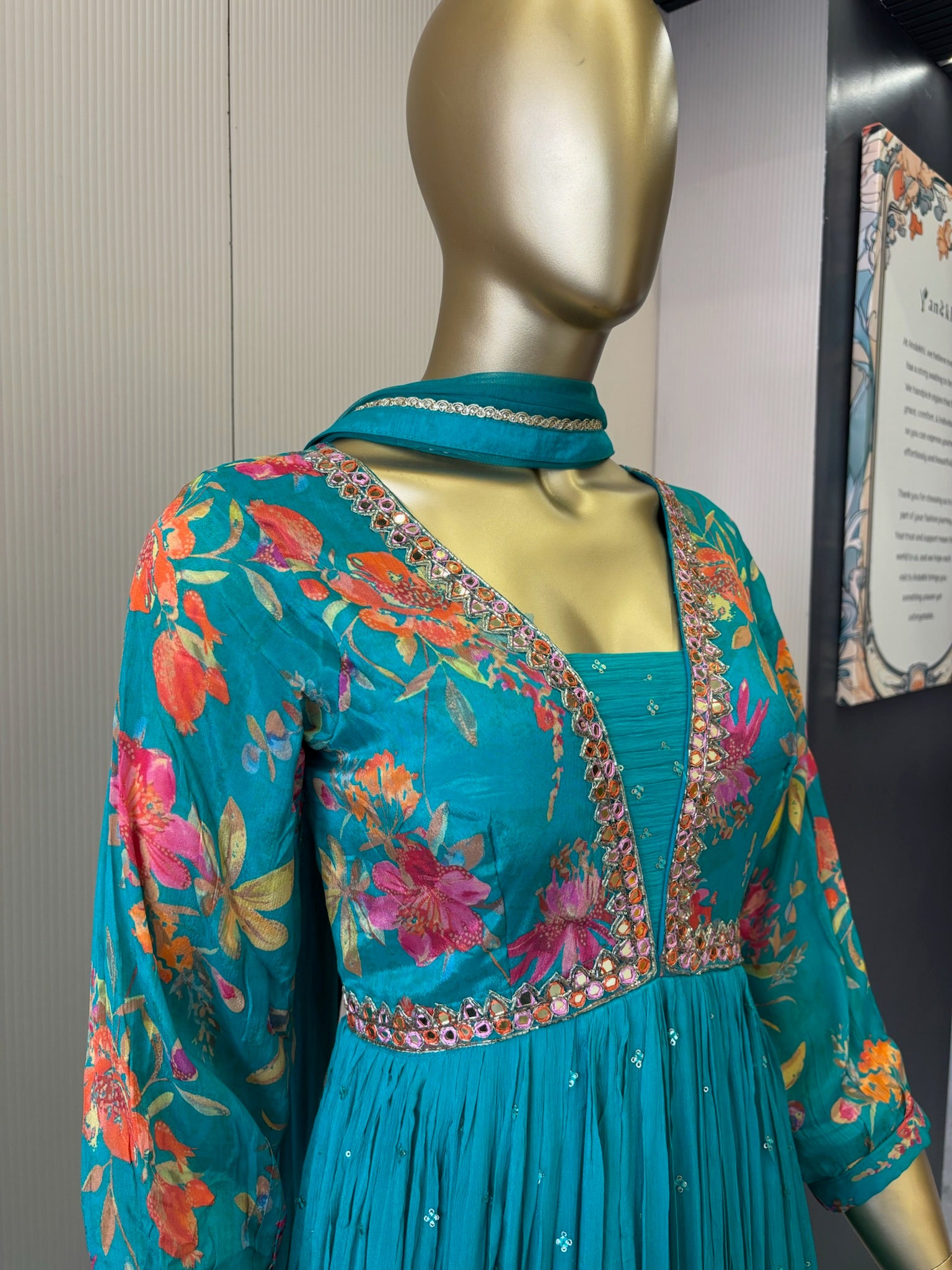 A1191 - A vibrant Pure Crepe Gown with Mirror work & a Flowy Elegant Flare.