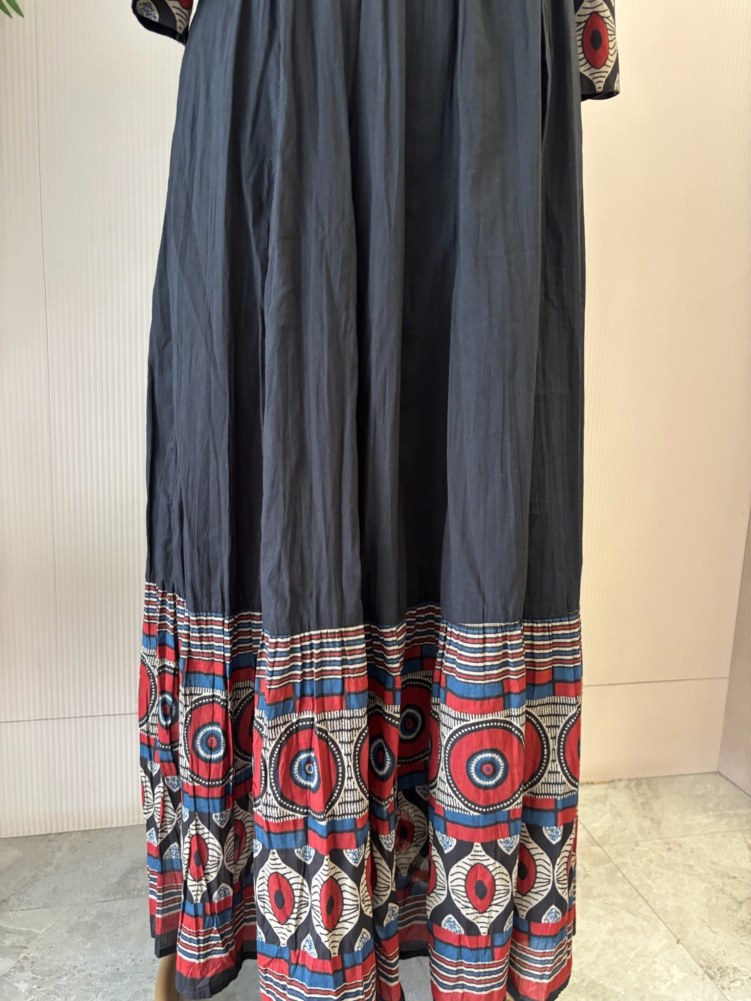 A3914- Pure Cotton Flared Gown adorned with vibrant prints on the Yoke, Sleeves & hem & elegant button detailing.