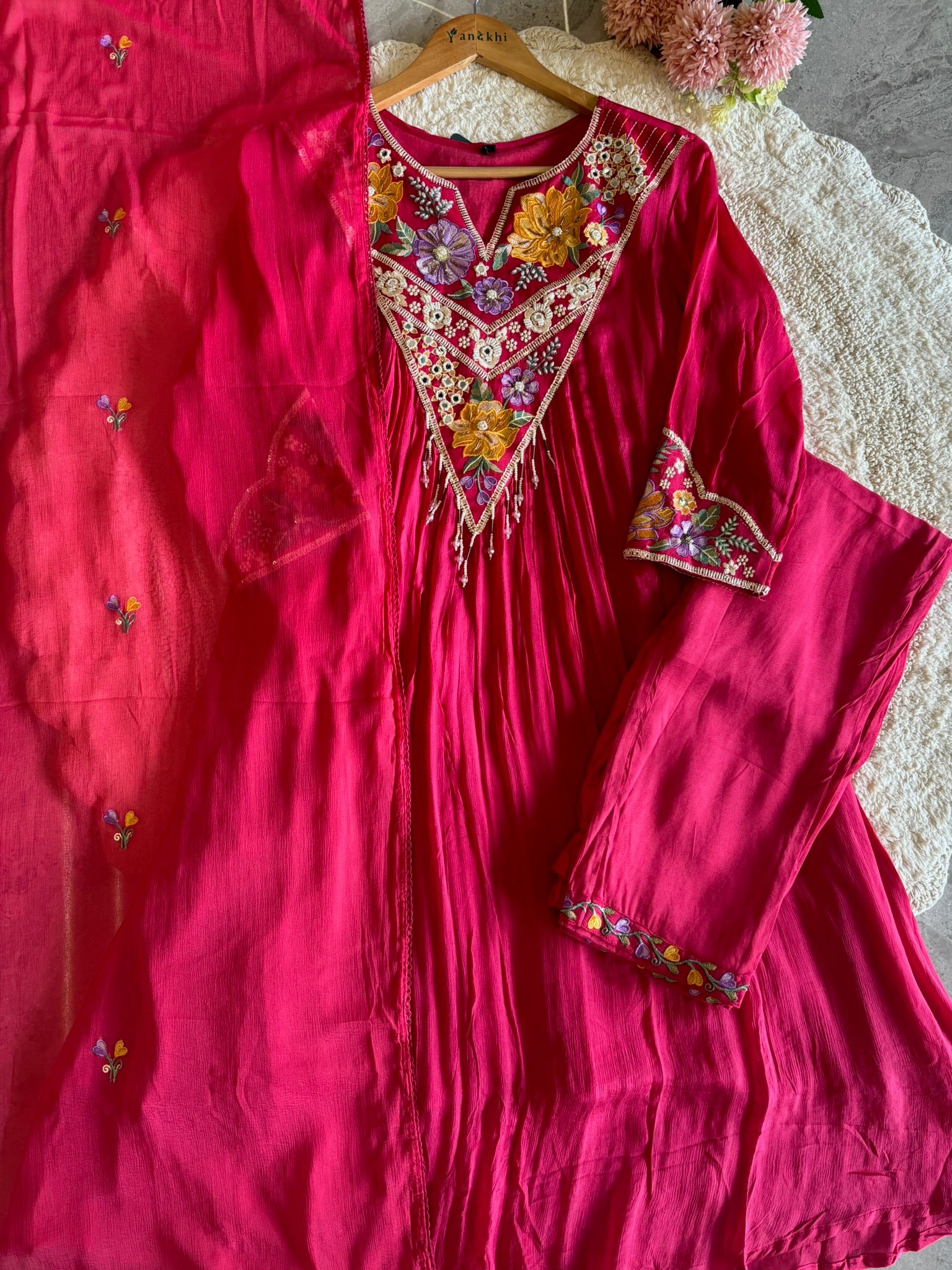 A1657- Elegant Chinon A-Line Suit with vibrant Floral Embroidery on the Yoke & Sleeves, with Pants and a delicately Embroidered Dupatta.