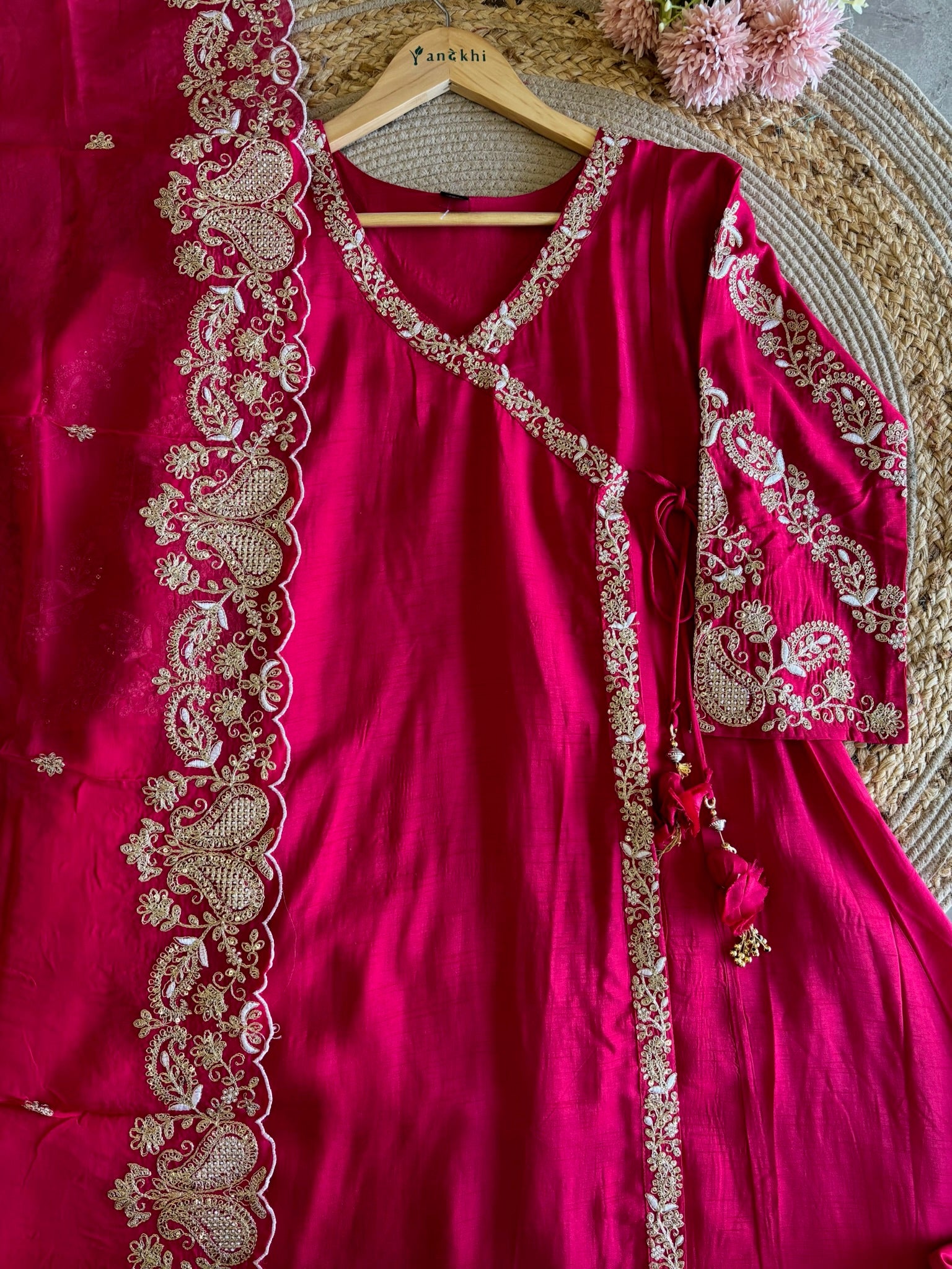 A4150- Dola Silk Angrakha Suit featuring all-over Embroidery, heavily embellished Sleeves, Matching Pants, & Embroidered Heavy Dupatta.