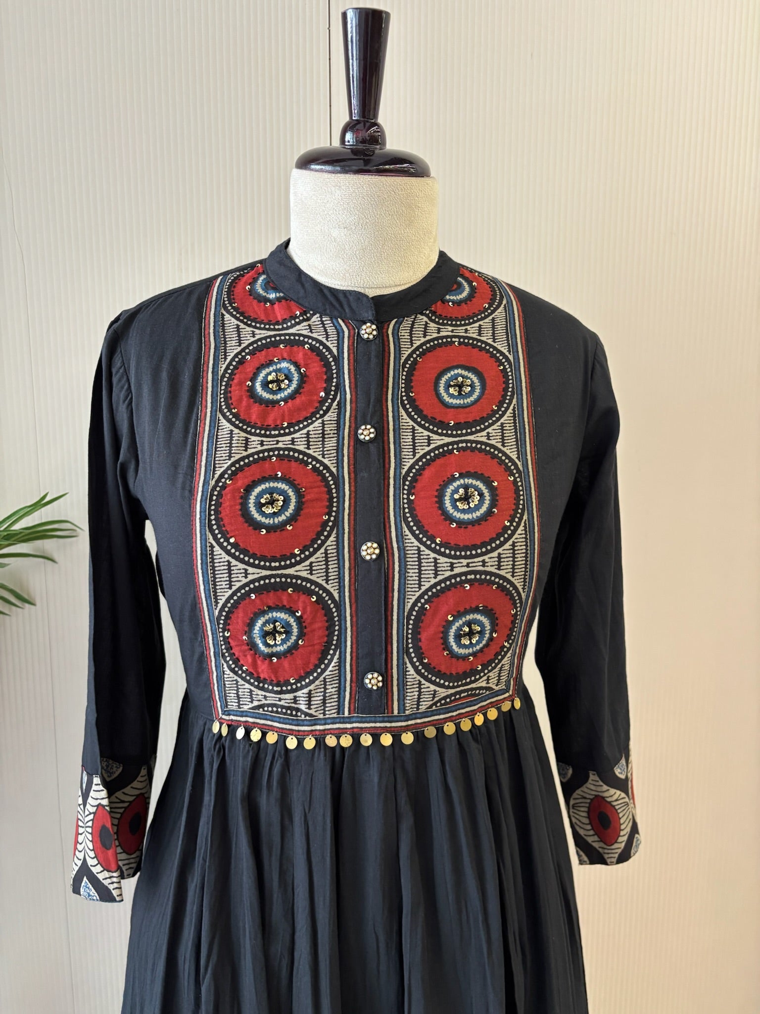 A3914- Pure Cotton Flared Gown adorned with vibrant prints on the Yoke, Sleeves & hem & elegant button detailing.