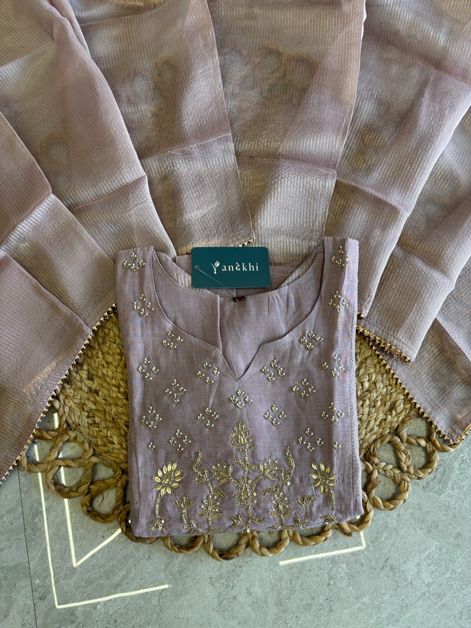 A4141- Mul Chanderi Silk Designer Suit with delicate Handwork, paired with Pants & a Striped Tissue Dupatta.
