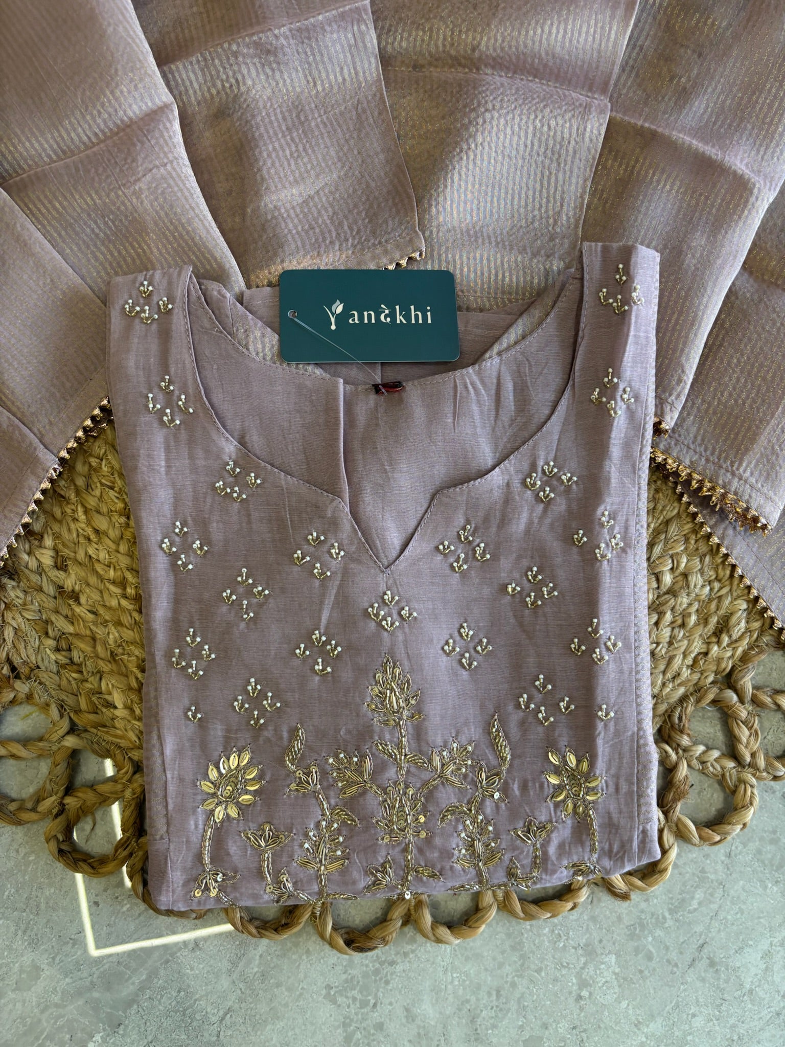 A4141- Mul Chanderi Silk Designer Suit with delicate Handwork, paired with Pants & a Striped Tissue Dupatta.